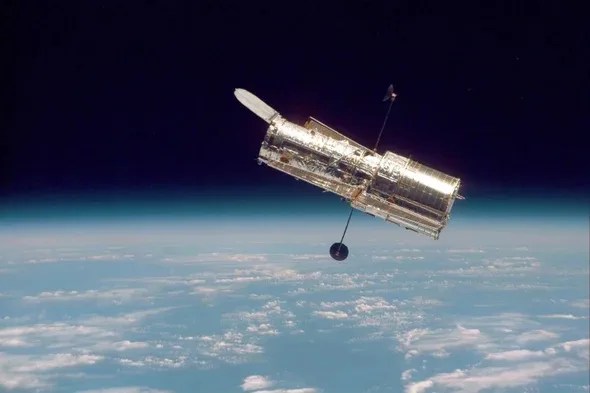 Hubble transmits about 150 gigabits of raw science data to Earth every week.